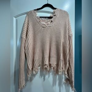 Gently used cream distressed sweater